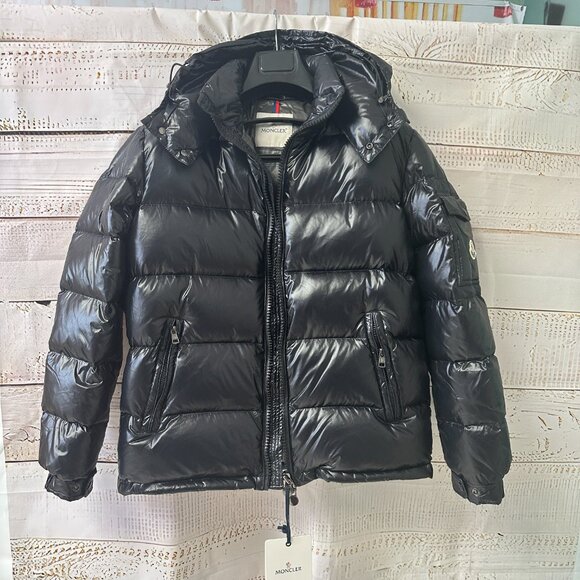 This Moncler down jacket, though a men's style - Picture 2 of 7